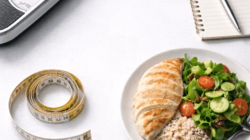 why crash diets fail illustrated with weighing scale and restrictive meal plan notebook