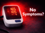 high blood pressure no symptoms silent disease concept with BP monitor alert